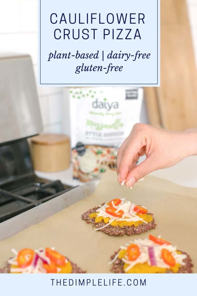 Cauliflower Crust Pizza with Daiya Mozzarella Recipe | This healthy homemade pizza recipe is easy to make and so good! It uses a non-dairy plant-based cheese, so you get all the cheesy goodness of real cheese without its drawbacks. It’s also gluten-free, completely plant-based, and loaded with healthy veggies. Click to get the full recipe for your next pizza night! | The Dimple Life #thedimplelife #pizzarecipes #plantbased