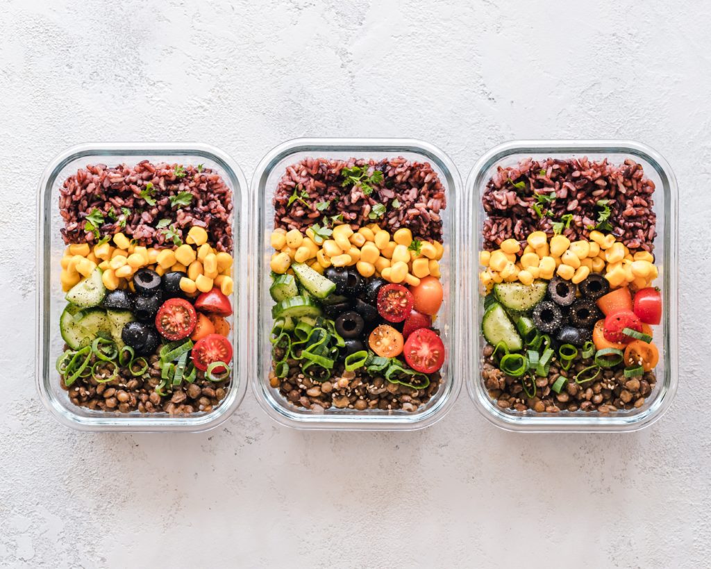 Flat Lay Photography Of Three Trays Of Food