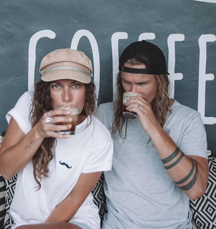 Man and woman drinking coffee