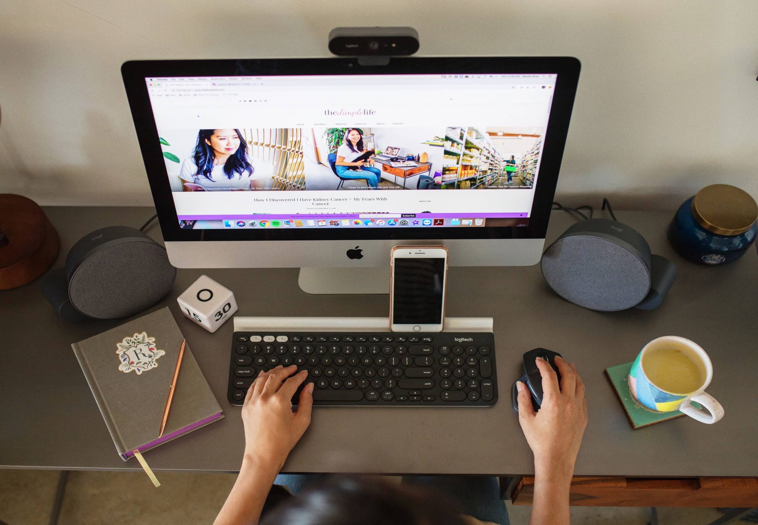 Overhead shot of female entrepreneur working on her computer.